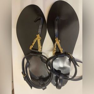 Brand: Versace Virtus Flat Sandal 
Size: 8 (W) 
Only Worn Twice.